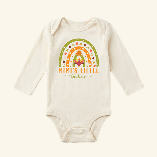 Toodleroos Mimi’s Little Turkey Baby Onesie – Grandma Thanksgiving Rainbow Bodysuit featuring a rainbow graphic with a turkey, pumpkin, and the text Mimi’s Little Turkey.