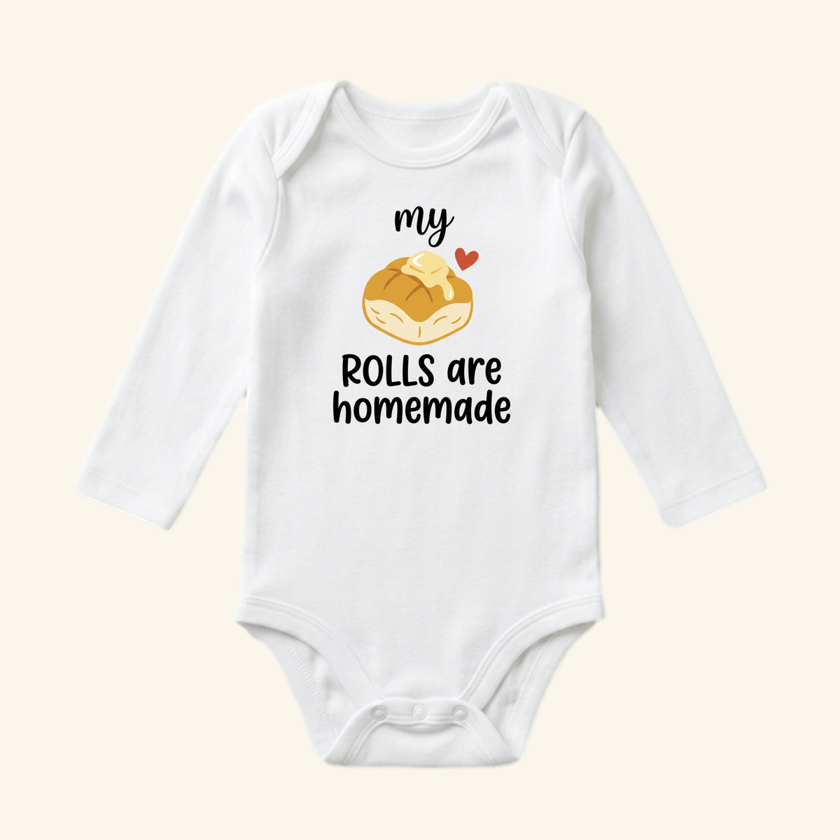 Toodleroos My Rolls Are Homemade Baby Thanksgiving Onesie - Fall Bodysuit, a white long-sleeve baby bodysuit with an illustration of a buttered roll and the text my ROLLS are homemade.