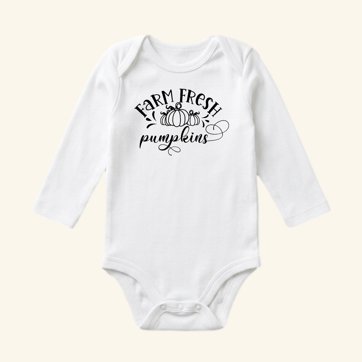 White long-sleeve Toodleroos Farm Fresh Pumpkins Baby Onesie – Fall Farmhouse Pumpkin Bodysuit with the text Farm Fresh pumpkins and a line drawing of two pumpkins on the chest.