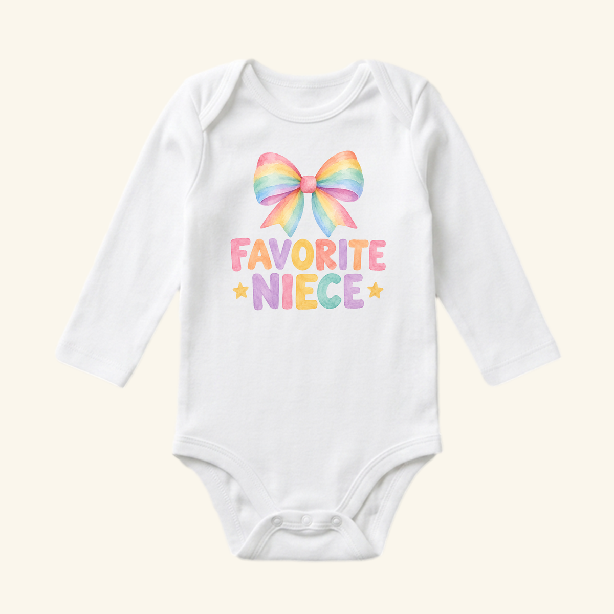 Toodleroos Favorite Niece Baby Onesie – Cute Rainbow Bow Bodysuit, a white long-sleeve baby girl bodysuit featuring a watercolor rainbow bow above the text FAVORITE NIECE flanked by two small stars.