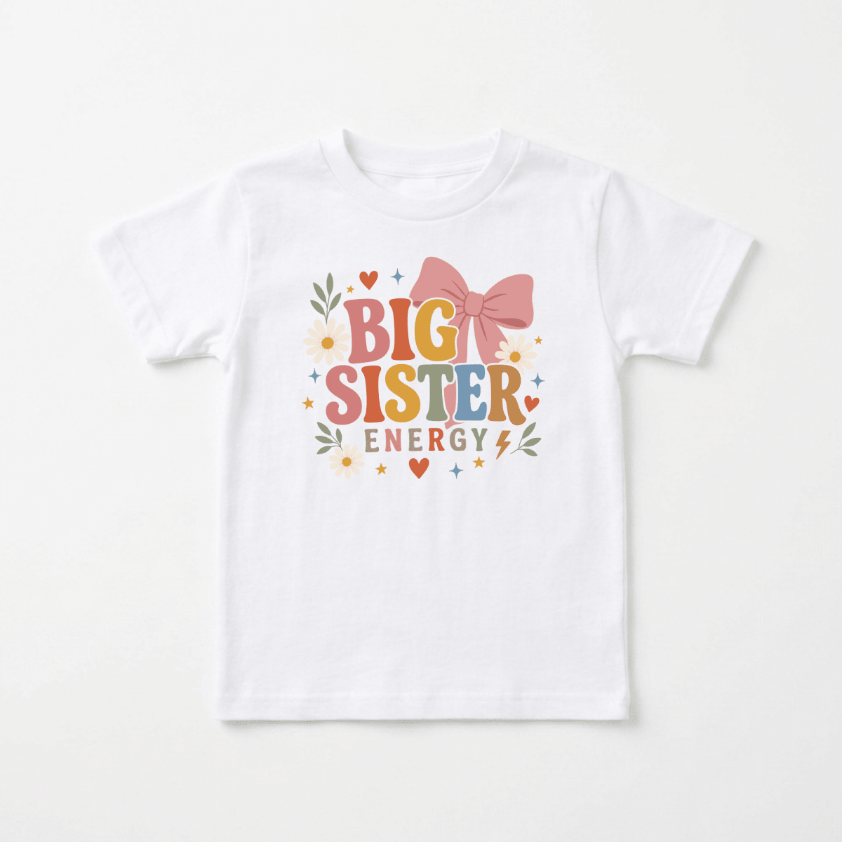 Dress your little one in the adorable Big Sister Energy Toddler Shirt – Retro Floral Design by Toodleroos! This white shirt features colorful “Big Sister Energy” text surrounded by a large pink bow, small hearts, stars, flowers, and leaves. It’s perfect as a big sister shirt or an adorable pregnancy announcement toddler tee!.