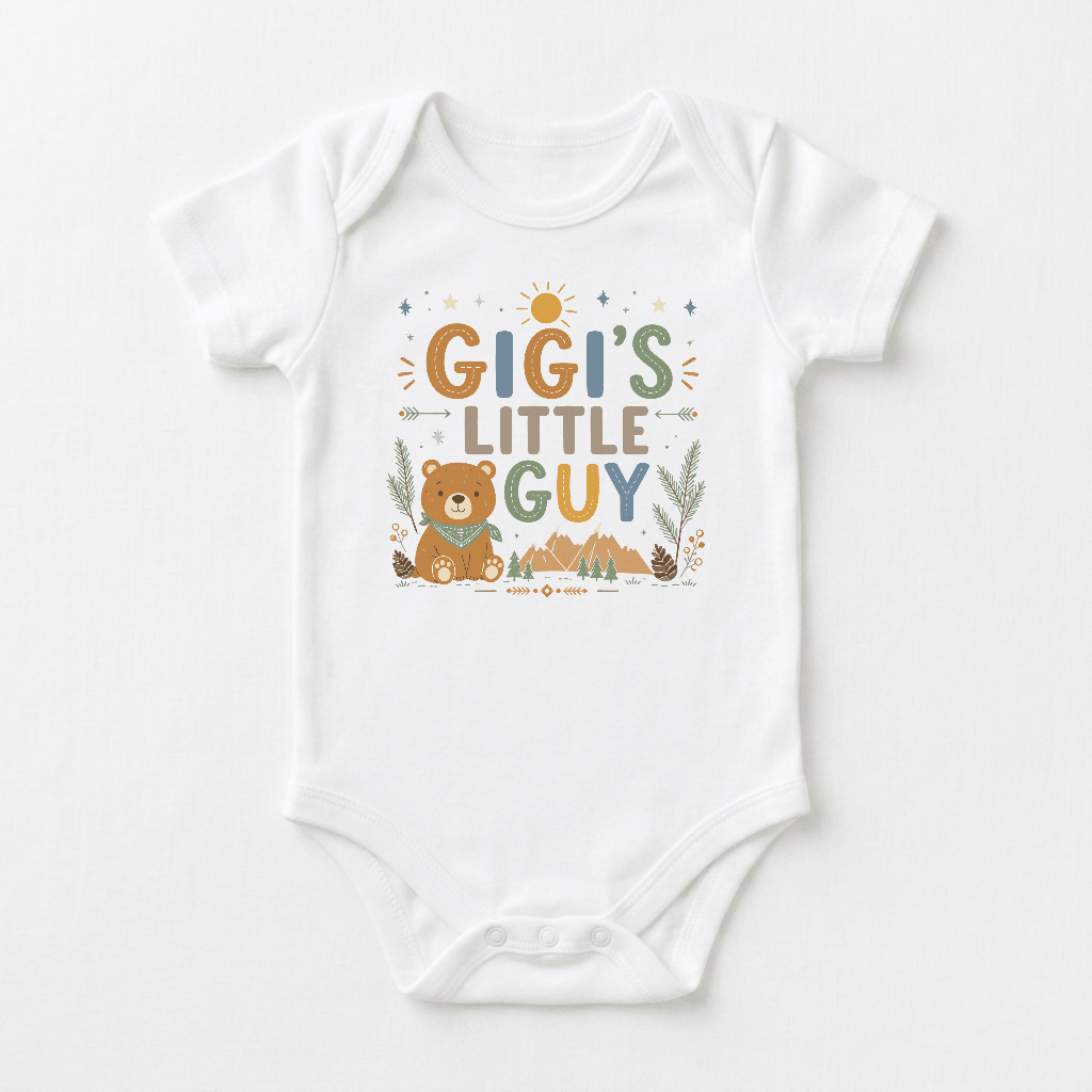 Dress your new grandson in the Gigi’s Little Guy Baby Onesie – Woodland Bear Design by Toodleroos, featuring colorful “Gigi’s Little Guy” text with cute bear, leaves, and mountain illustrations—an adorable baby shower gift or special Gigi baby onesie.