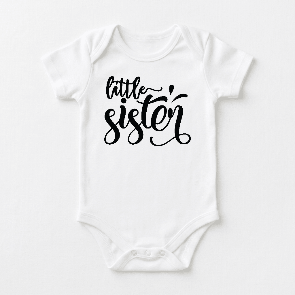 Dress your baby girl in the Toodleroos Little Sister Baby Onesie, featuring a hand-lettered “little sister” design in playful black cursive across the chest—perfect for sibling outfits or as an adorable little sister bodysuit.