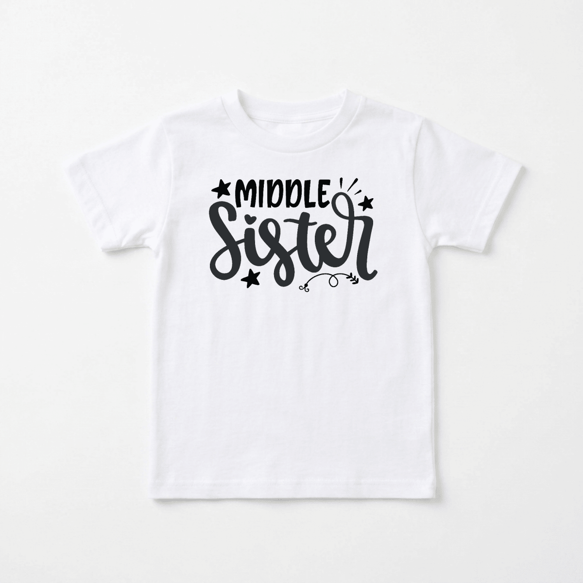 The Middle Sister Toddler Shirt by Toodleroos features “Middle Sister” in a playful black hand-lettered script, accented with small stars and decorative lines. Perfect as an adorable sibling gift, this Hand-Lettered Sibling Design shirt is shown laid flat on a plain white background.