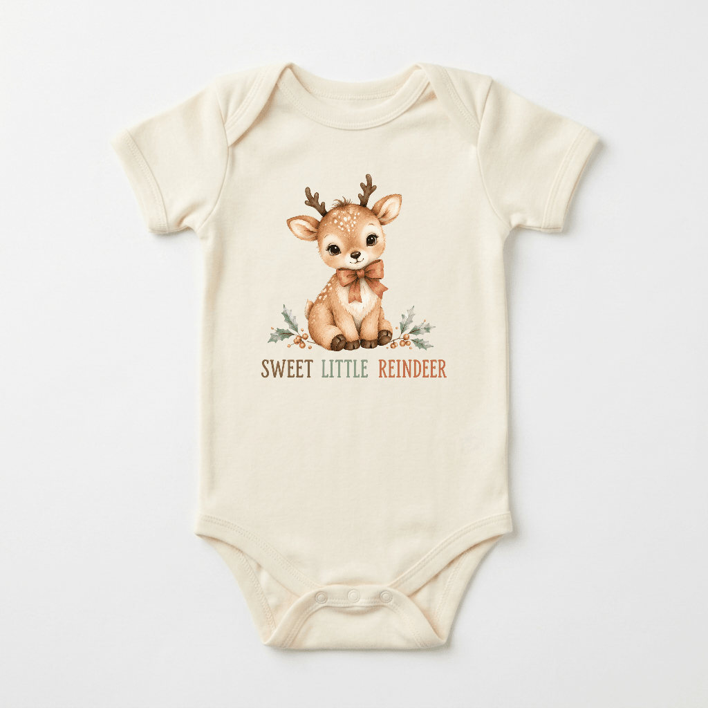 Introducing the Sweet Little Reindeer Christmas Baby Onesie from Toodleroos—a cream-colored outfit featuring a charming illustration of a reindeer wearing a bow, complemented by delicate floral accents and the phrase “Sweet Little Reindeer” beneath. Perfect for celebrating baby’s first Christmas, this neutral piece makes an adorable addition to any holiday wardrobe and is ideal for those seeking festive yet subtle Christmas baby clothes.