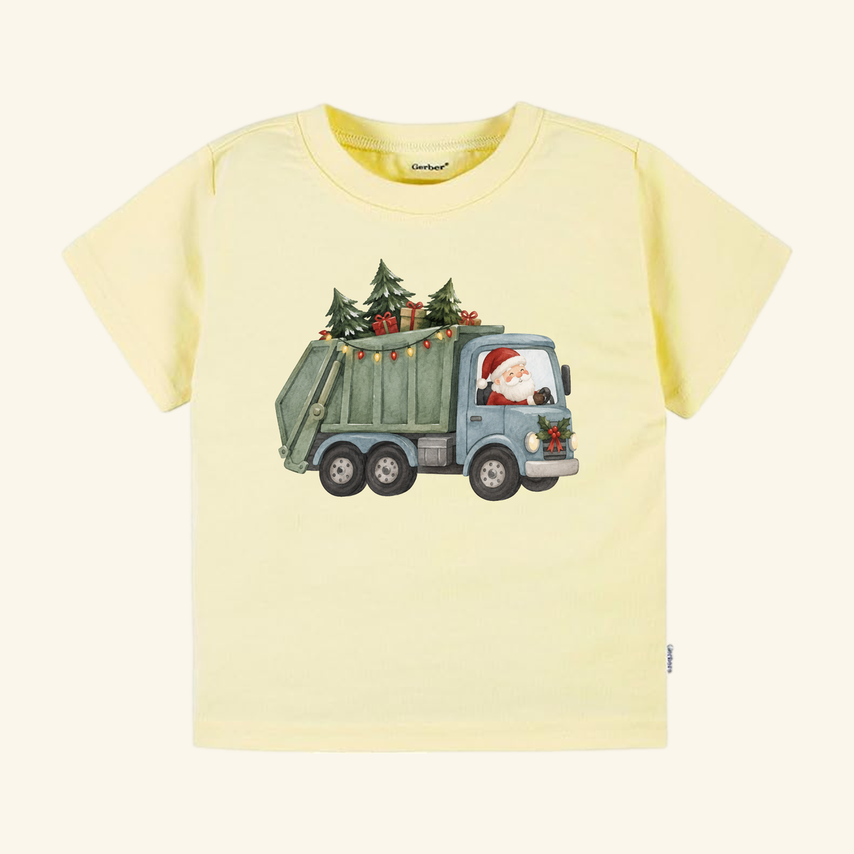 Pale yellow Toodleroos Santa Garbage Truck Toddler Shirt featuring Santa Claus driving a garbage truck topped with Christmas trees and wrapped gifts.