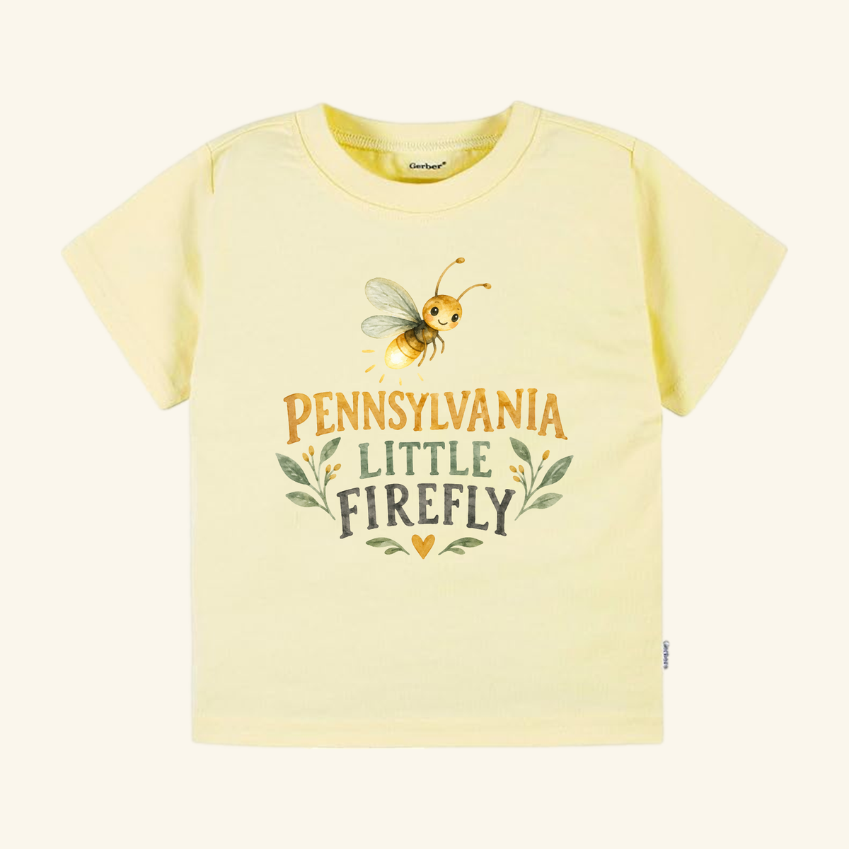 Pale yellow Pennsylvania Toddler Shirt – Little Firefly Watercolor Tee featuring a watercolor firefly illustration above the text PENNSYLVANIA LITTLE FIREFLY, surrounded by small green leaves and a heart.
