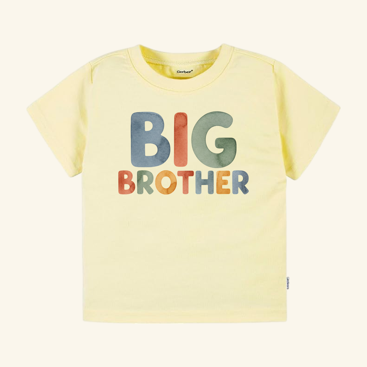 Pale yellow Big Brother Watercolor Toddler Shirt – Boho Sibling Announcement Tee featuring the words BIG BROTHER in multicolored, watercolor-style letters.