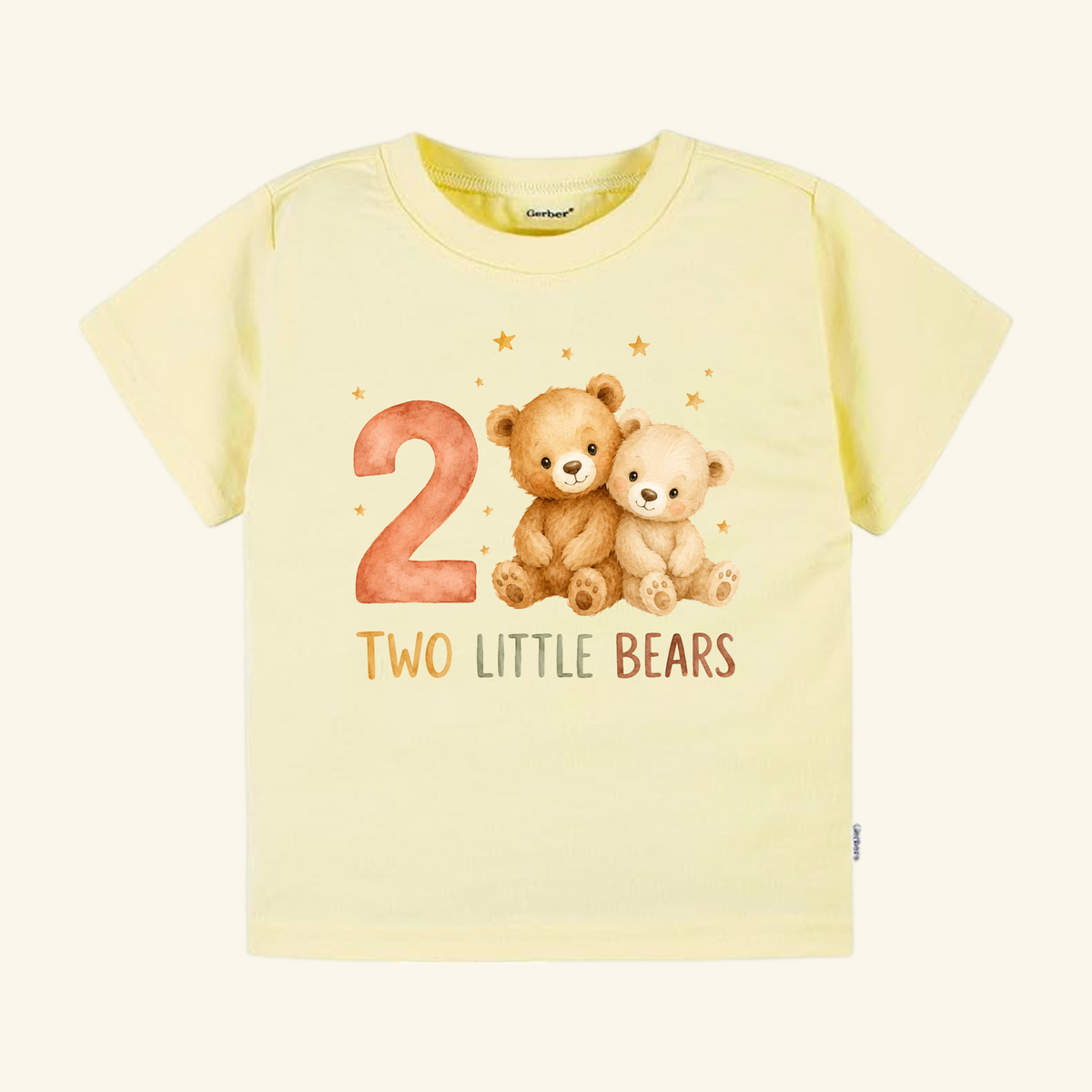 Pale yellow Two Little Bears 2nd Birthday Toddler Shirt – Short-Sleeve Tee featuring a watercolor illustration of two teddy bears, the number 2, and the text TWO LITTLE BEARS surrounded by small stars.
