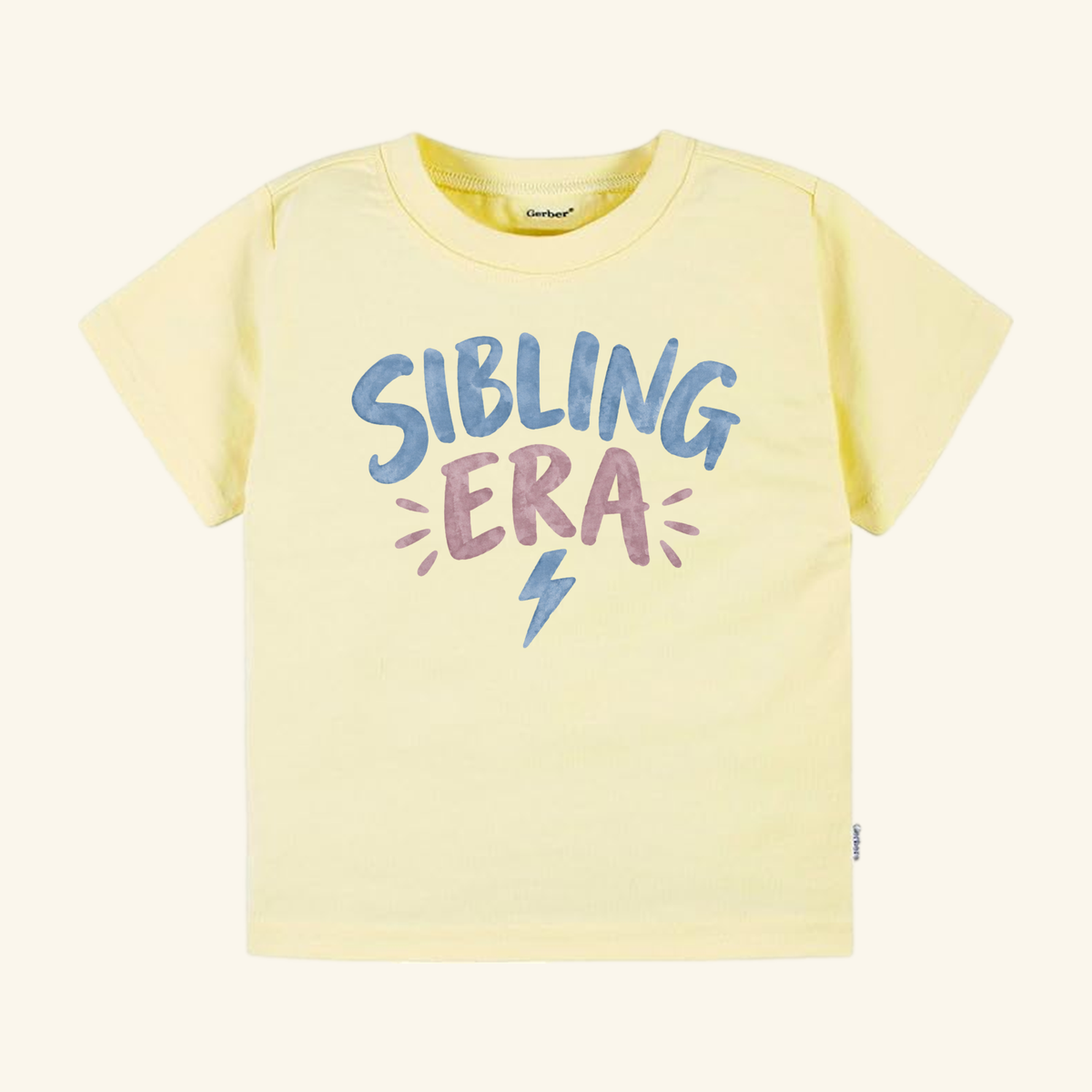 Pale yellow gender-neutral Sibling Era Toddler Shirt – Lightning Bolt Sibling Tee featuring a lightning bolt graphic and the text SIBLING ERA.