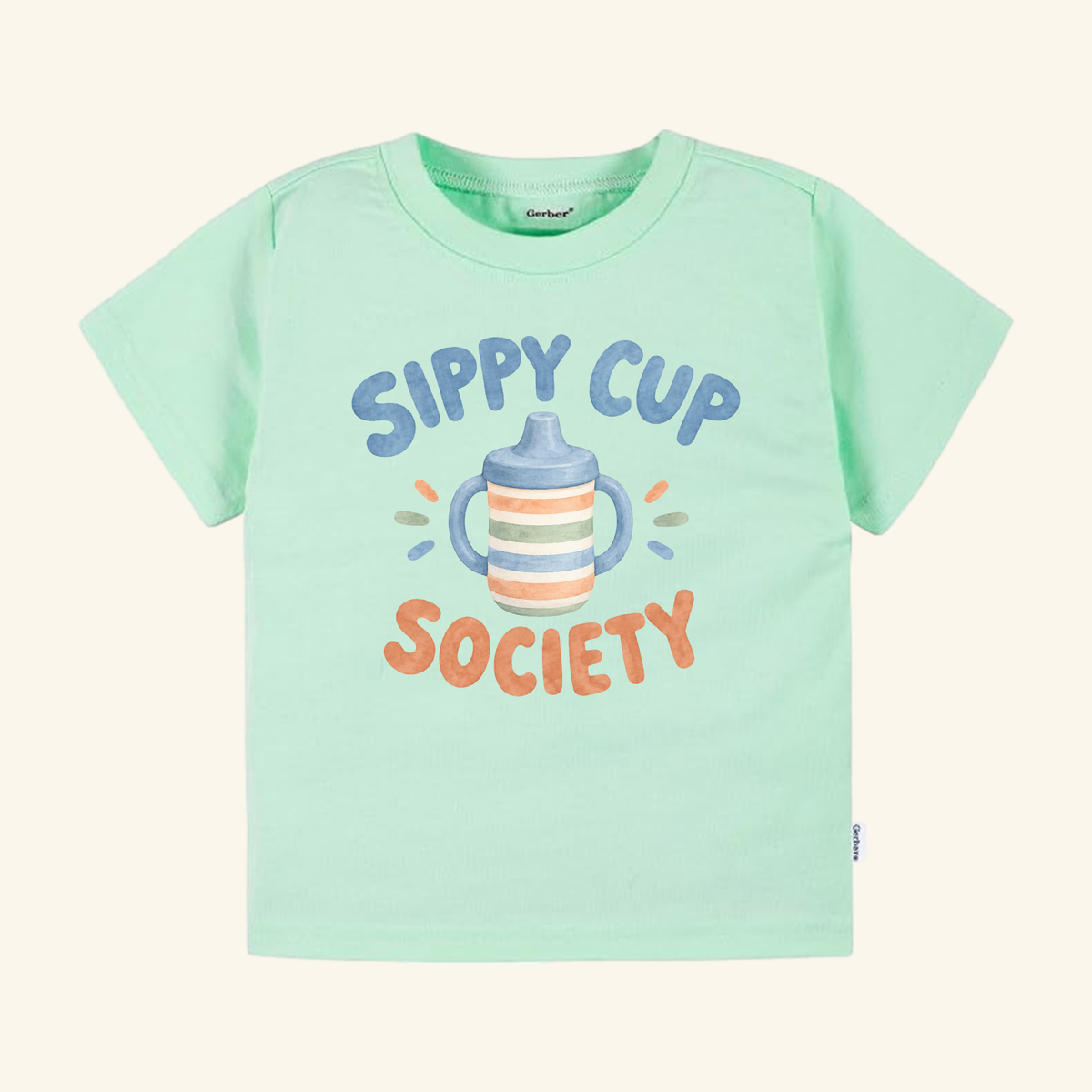 Light green Toodleroos Sippy Cup Society Toddler Shirt – Funny Toddler Humor Tee featuring a graphic of a sippy cup and the text Sippy Cup Society.