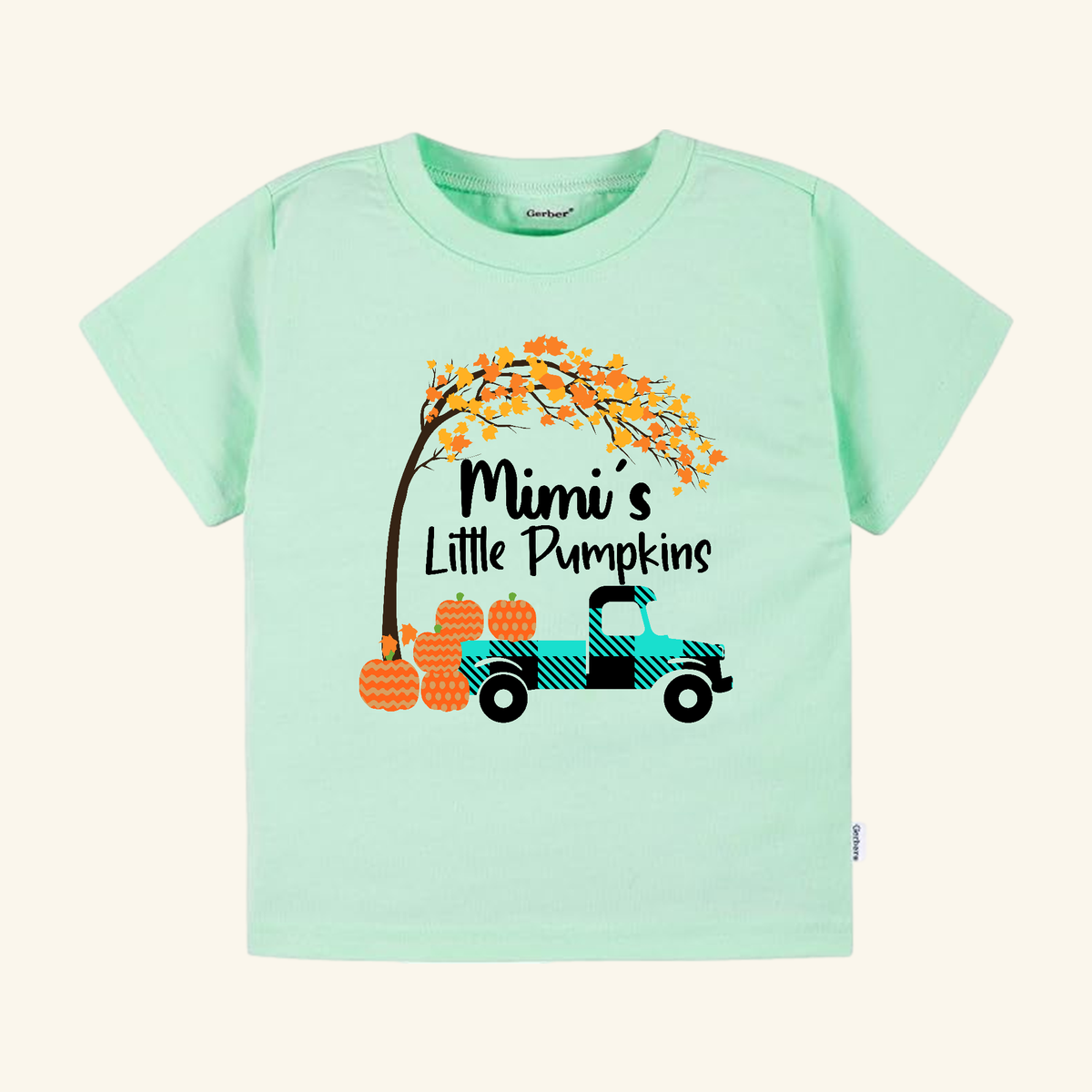 Light green Mimi’s Little Pumpkins Toddler Shirt featuring a farmhouse fall graphic of a plaid truck carrying pumpkins under a tree, with the text Mimi’s Little Pumpkins.