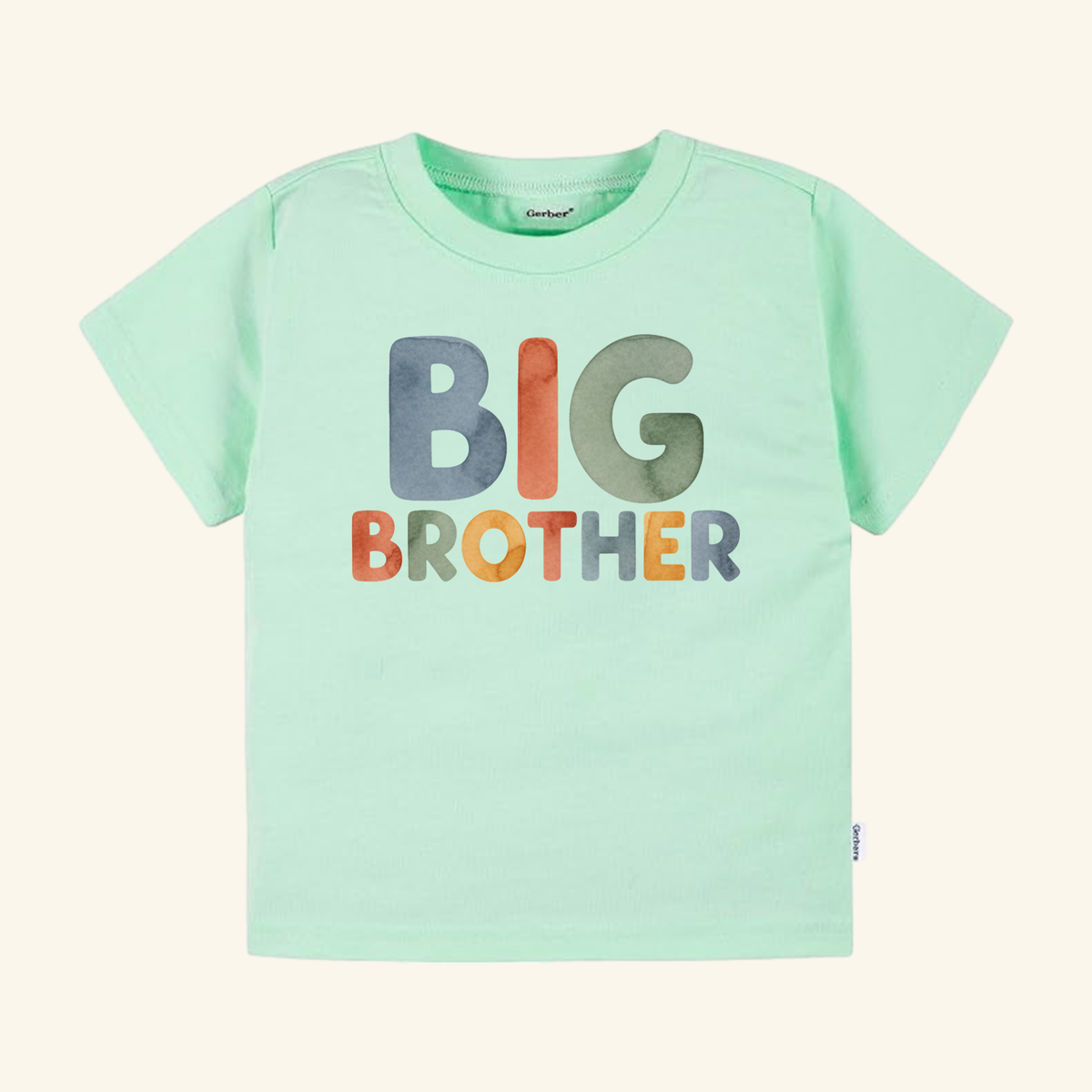 Light green Big Brother Watercolor Toddler Shirt – Boho Sibling Announcement Tee featuring BIG BROTHER in multicolored, watercolor-style lettering.