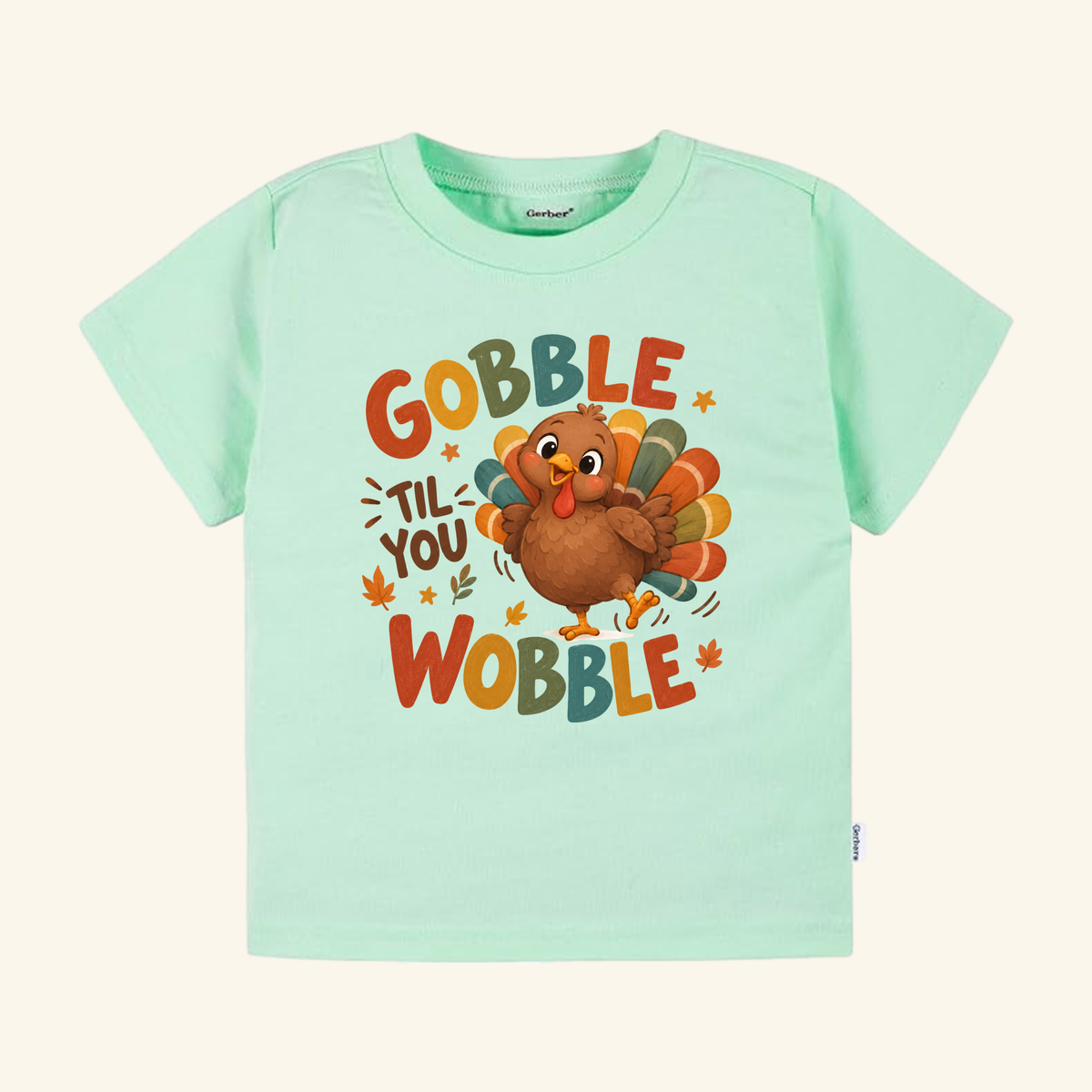 Light green Gobble Til You Wobble Toddler Thanksgiving Shirt – Funny Turkey Tee featuring a funny turkey.
