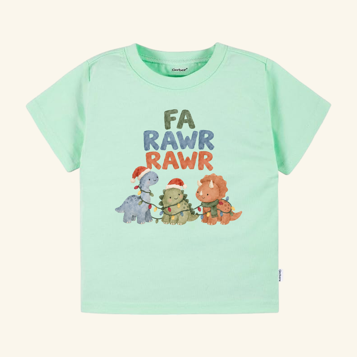 Fa Rawr Rawr Toddler Shirt in mint green featuring three dinosaurs wearing Santa hats and tangled in Christmas lights, with the text FA RAWR RAWR above them.
