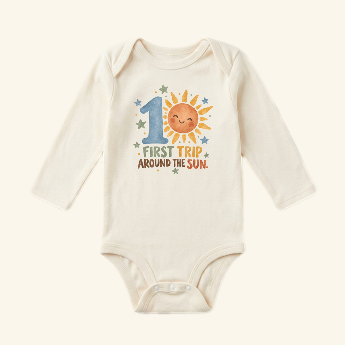 Toodleroos First Trip Around the Sun 1st Birthday Baby Onesie – Sunshine Bodysuit: a long-sleeved cream baby bodysuit with a smiling sun graphic and 1st Trip Around the Sun text.