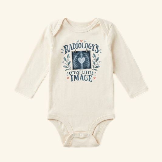 Cream long-sleeved Radiology’s Cutest Little Image Baby Onesie featuring an X-ray heart graphic with floral accents and the text Radiology’s Cutest Little Image.