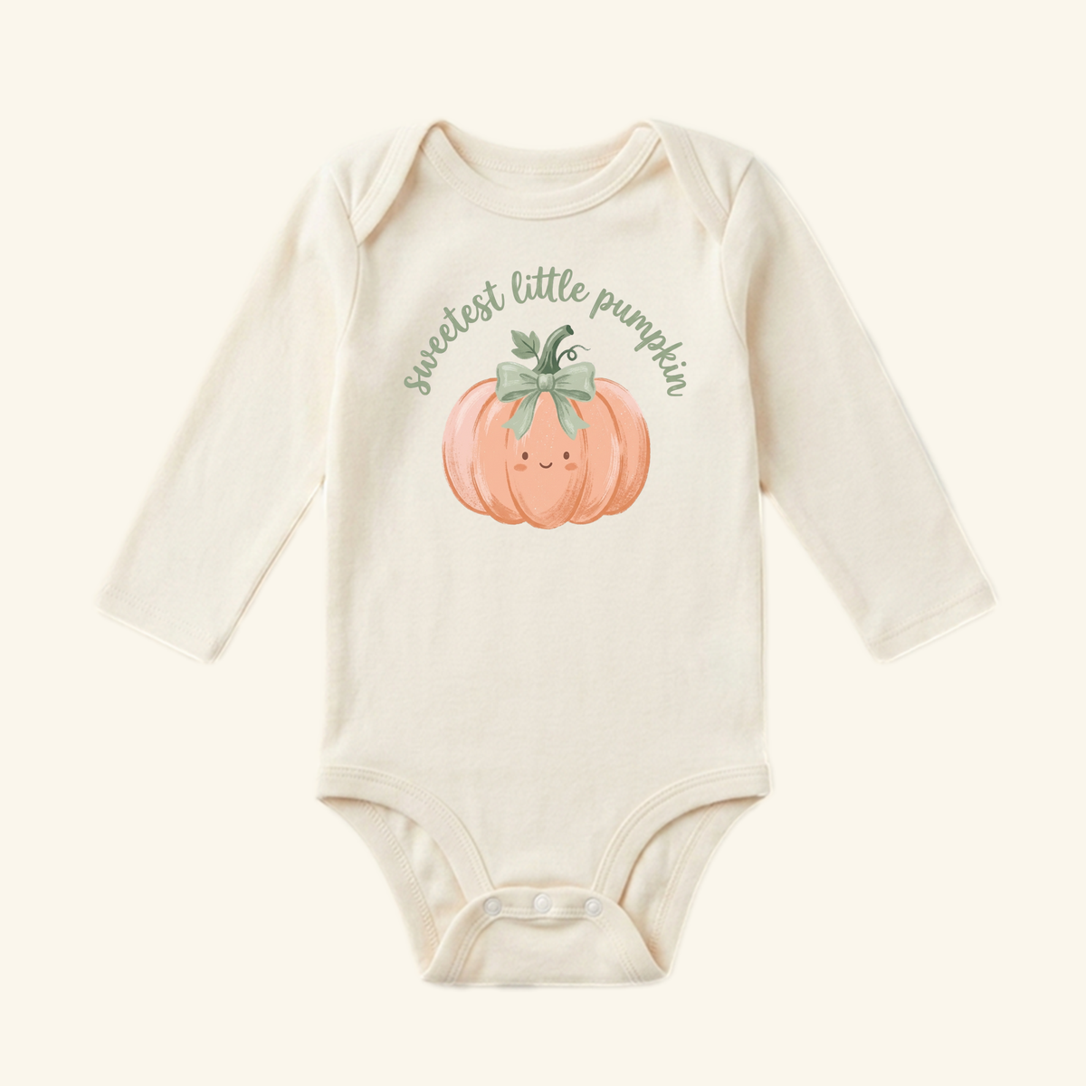 Sweetest Little Pumpkin Baby Onesie – Fall Pumpkin Bow Bodysuit, a long-sleeve bodysuit featuring a smiling orange pumpkin with a green bow and the text sweetest little pumpkin printed above it.