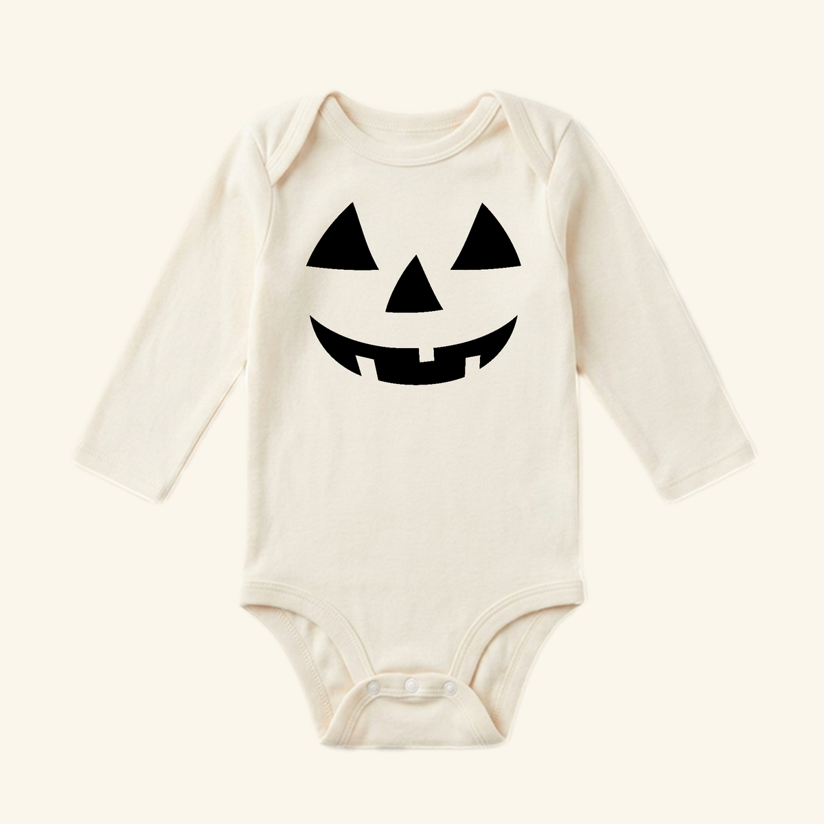 Toodleroos Halloween Baby Onesie – Jack-O’-Lantern Pumpkin Bodysuit featuring a long-sleeve design with a black jack-o’-lantern face printed on the chest.