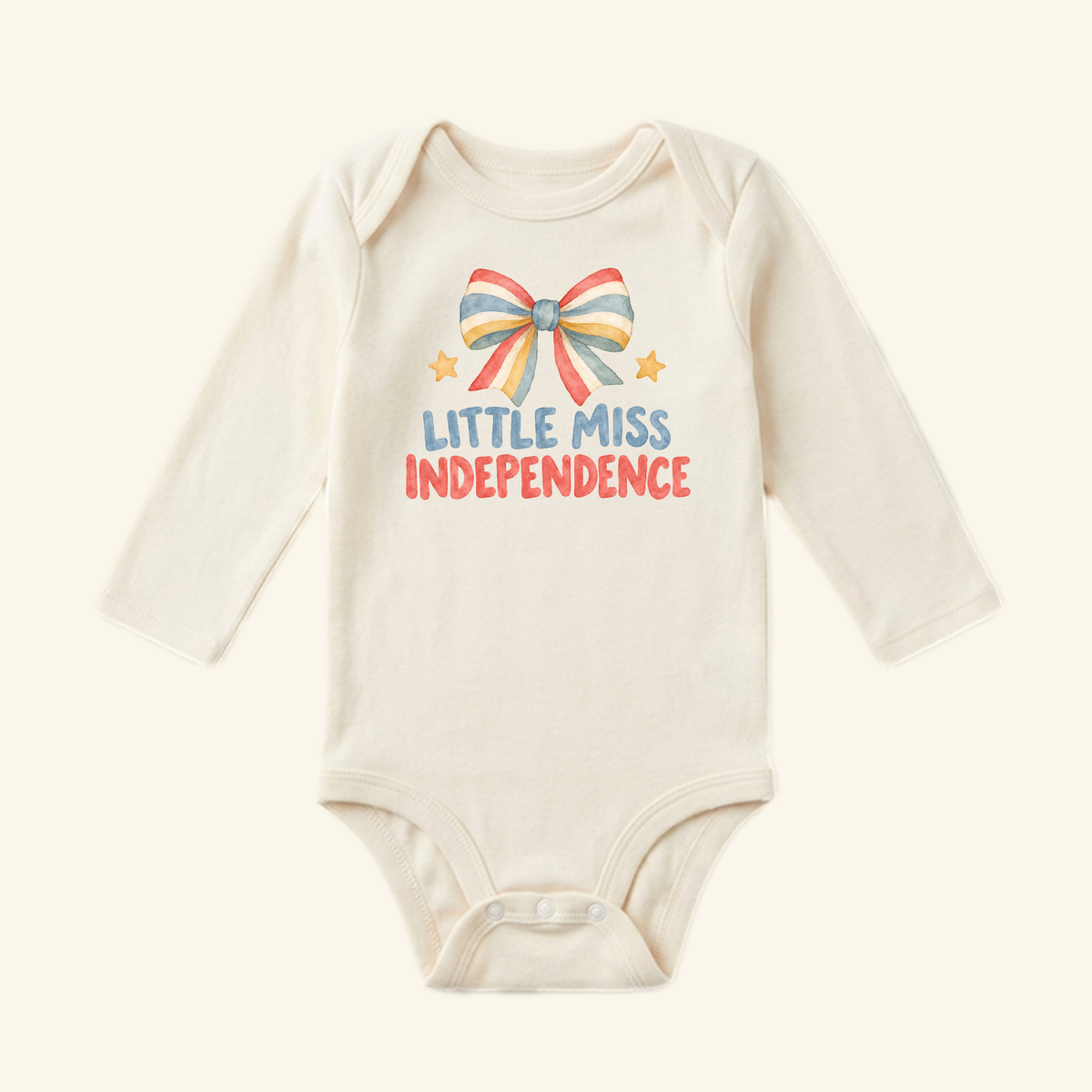 Long-sleeve Little Miss Independence Baby Onesie – Patriotic Bow Bodysuit featuring a graphic of a striped bow, two small stars, and the text LITTLE MISS INDEPENDENCE.