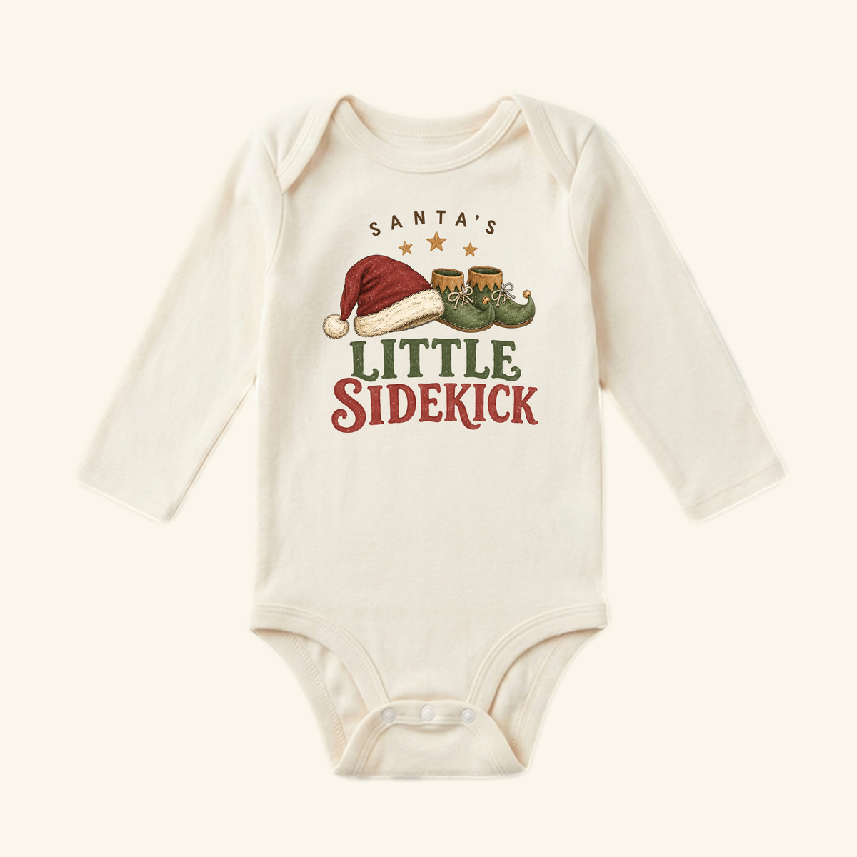 Toodleroos Santa’s Little Sidekick Baby Onesie – Christmas Elf Bodysuit featuring a long-sleeve design with an illustration of a Santa hat and elf shoes.