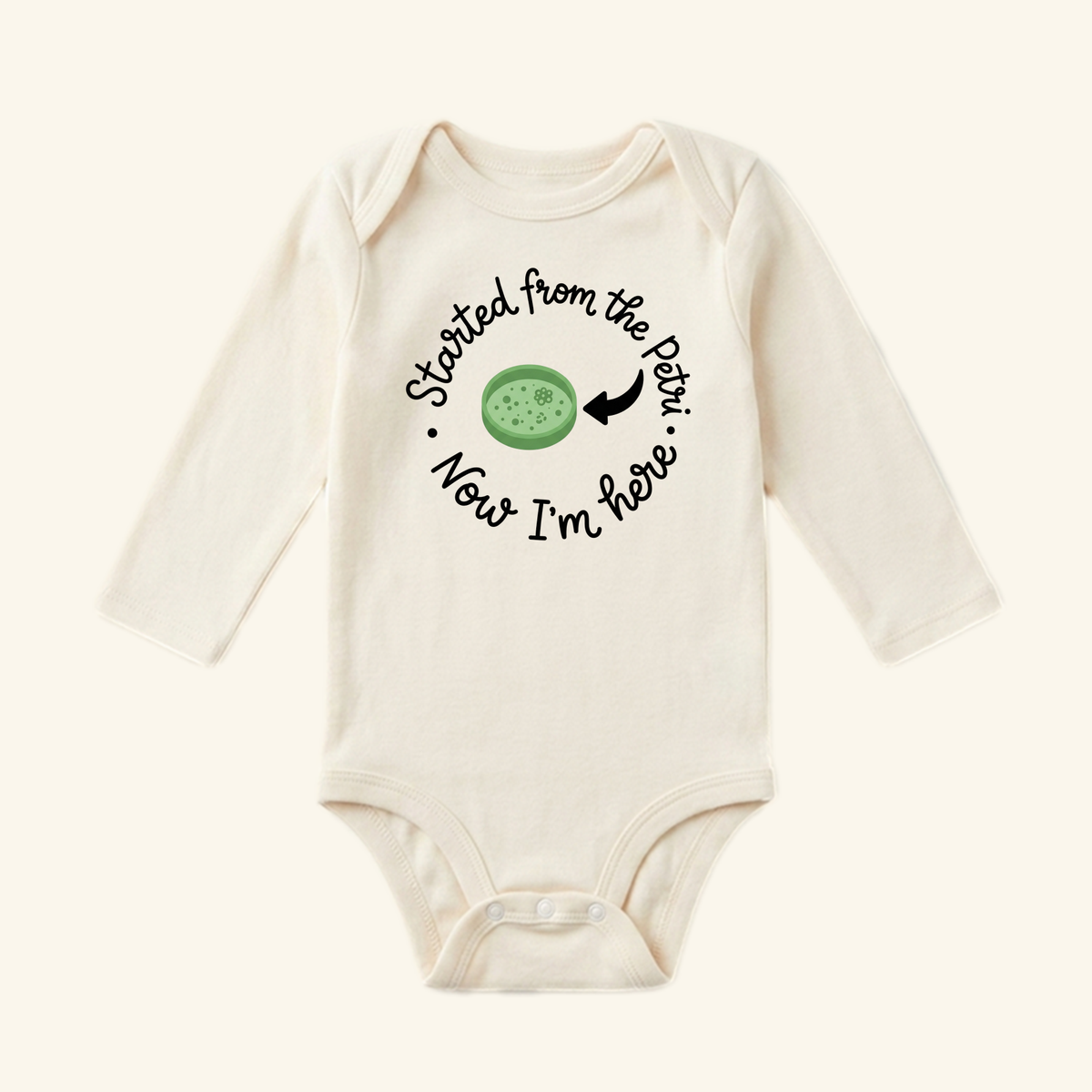 Started From the Petri Baby Onesie – Funny IVF Baby Bodysuit featuring a long-sleeved design with an illustration of a petri dish and the text, Started from the Petri, Now I’m here.
