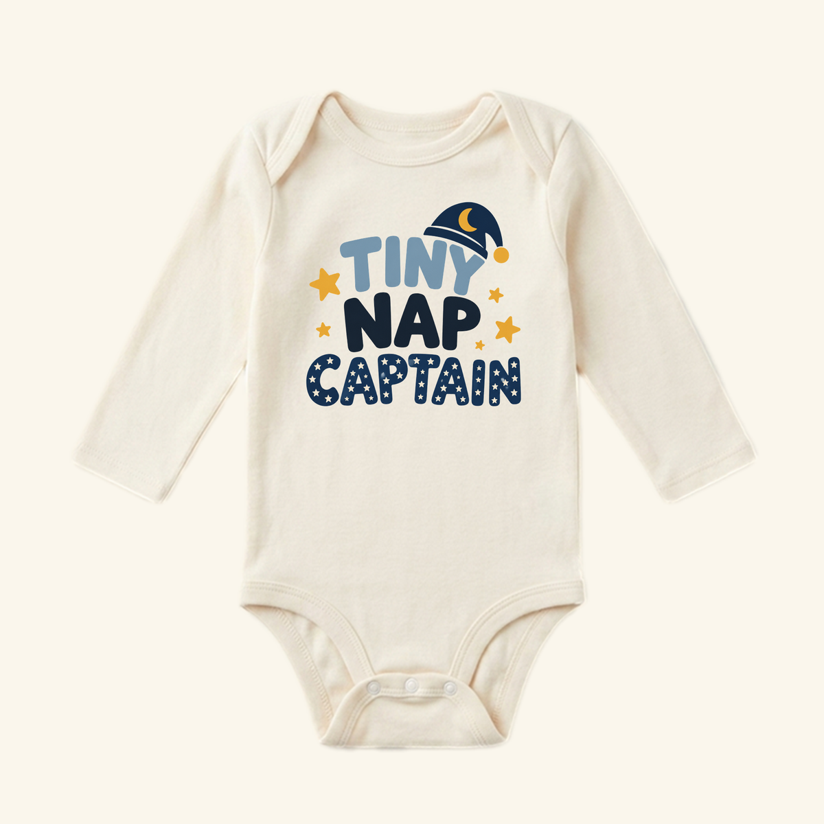 Toodleroos Funny Baby Onesie – Tiny Nap Captain Sleepy Baby Bodysuit featuring a sleeping cap, stars, and the text TINY NAP CAPTAIN; a perfect gender-neutral baby gift.