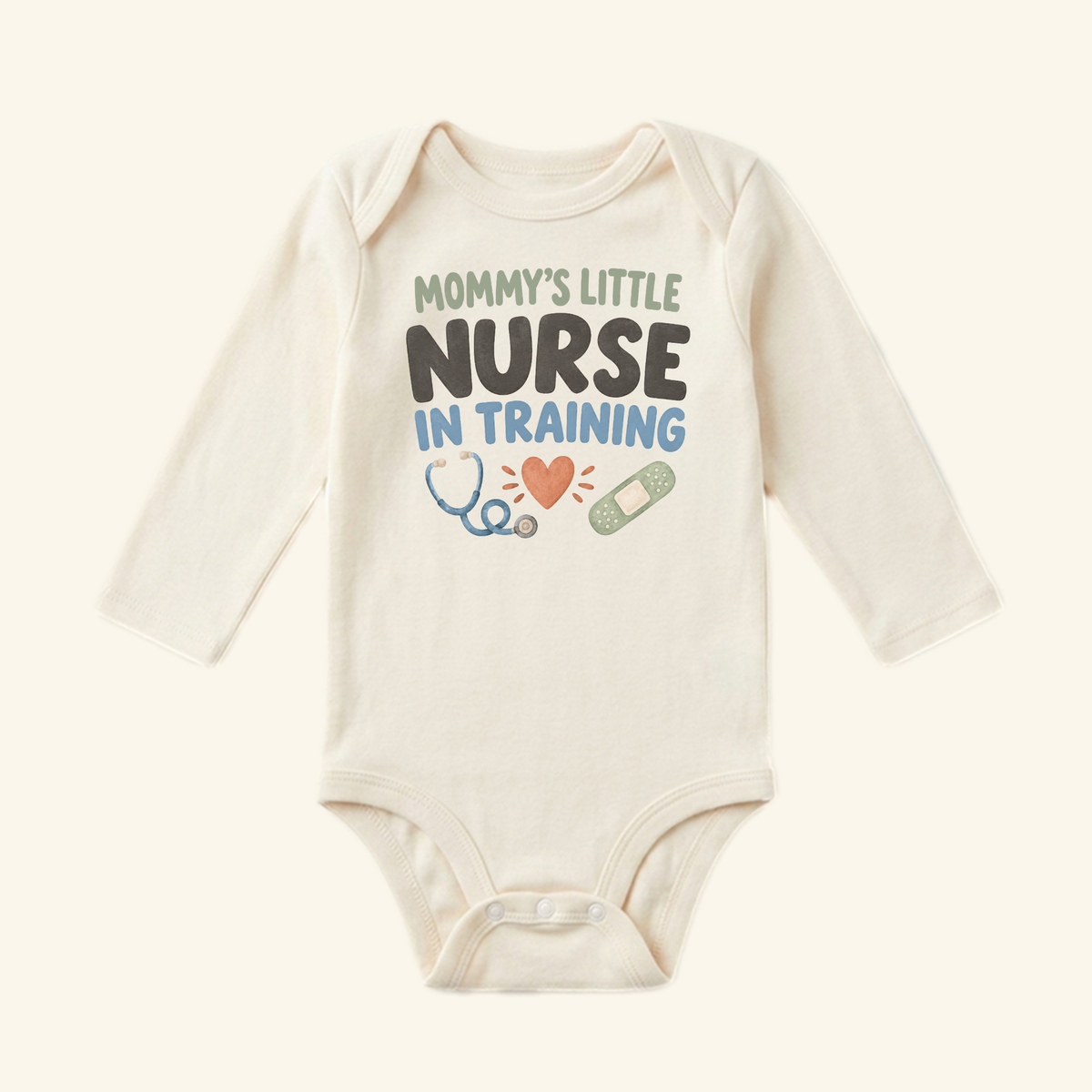 Mommy’s Little Nurse in Training Baby Onesie featuring the text Mommy’s little nurse in training above illustrations of a stethoscope, a heart, and a bandage.