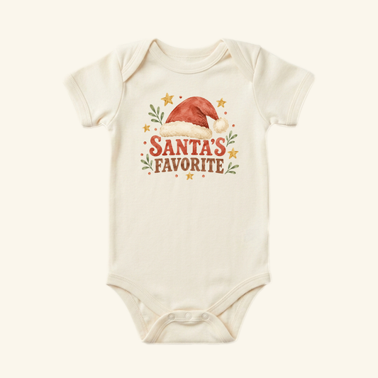 Cream-colored Santa’s Favorite Baby Onesie – Retro Christmas Santa Hat Bodysuit featuring a watercolor illustration of a Santa hat, greenery, and stars.