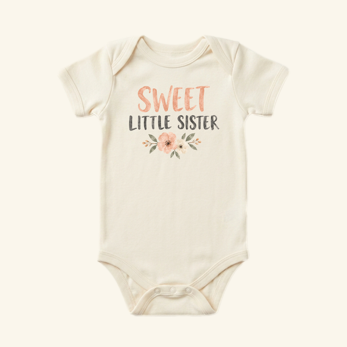 Toodleroos Sweet Little Sister Baby Onesie – Floral Sibling Bodysuit, a short-sleeve floral baby bodysuit with a Sweet Little Sister graphic printed on the chest.