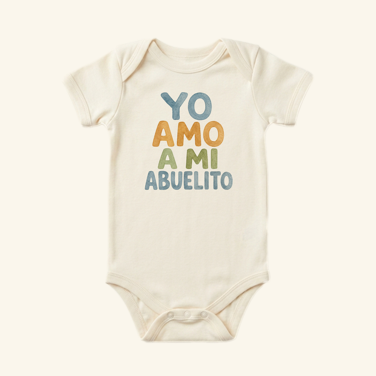 Off-white Toodleroos Yo Amo A Mi Abuelito Baby Onesie – Spanish Grandpa Bodysuit featuring YO AMO A MI ABUELITO in blue, orange, and green letters.