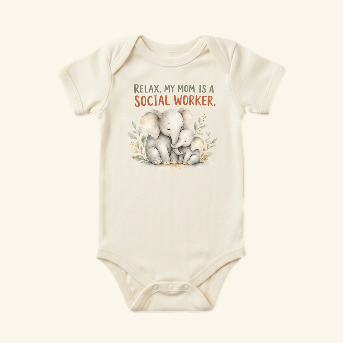 Cream-colored Social Worker Baby Onesie – Relax My Mom Is a Social Worker Bodysuit featuring a watercolor elephant illustration and the text, Relax, my mom is a social worker.