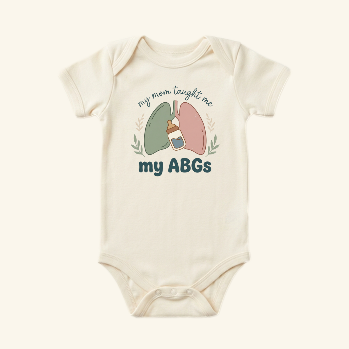 Toodleroos My Mom Taught Me My ABGs Baby Onesie featuring an illustration of lungs, a baby bottle, and the text my mom taught me my ABGs.