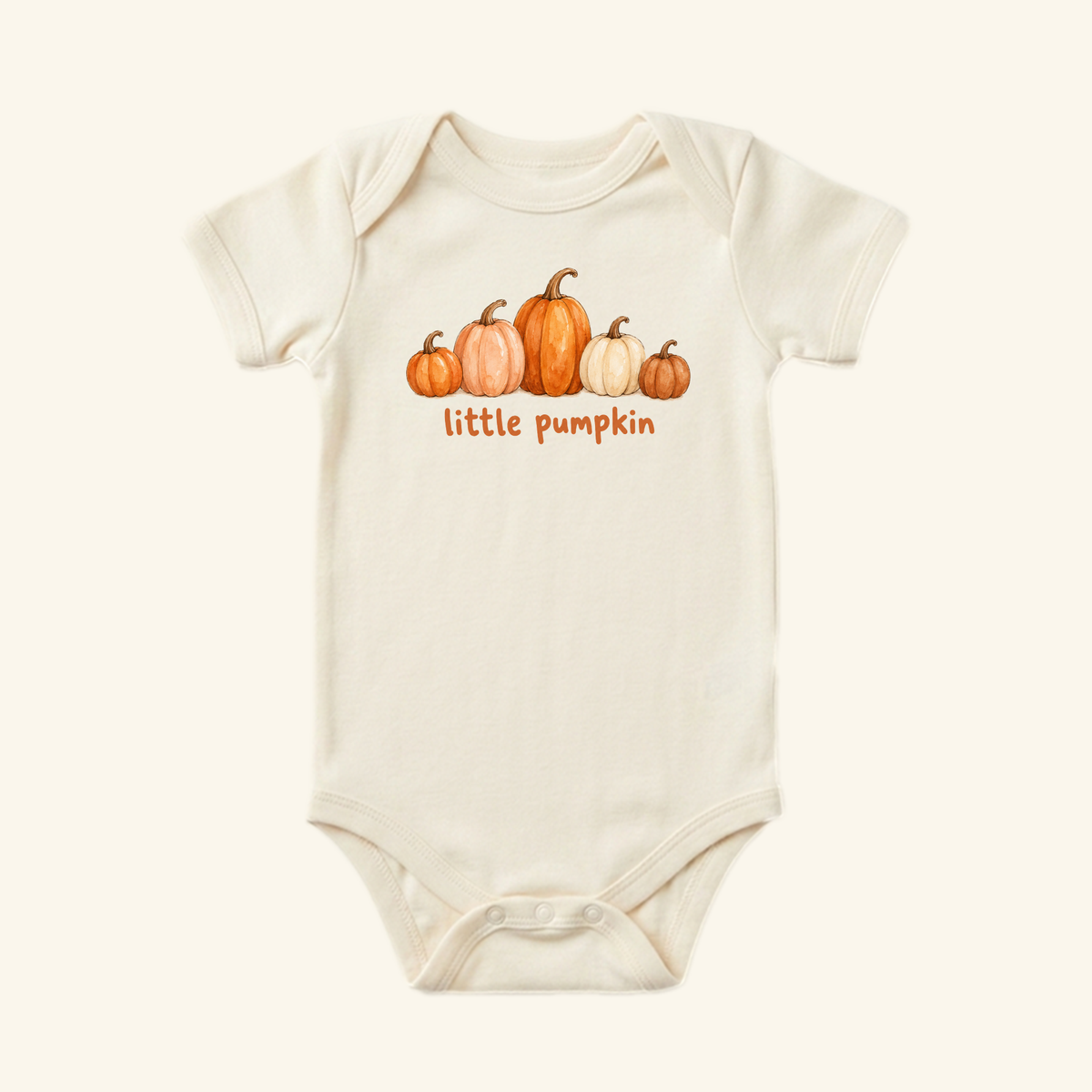 Cream-colored Little Pumpkin Baby Onesie – Watercolor Fall Pumpkin Bodysuit featuring a watercolor illustration of five pumpkins and the text little pumpkin.