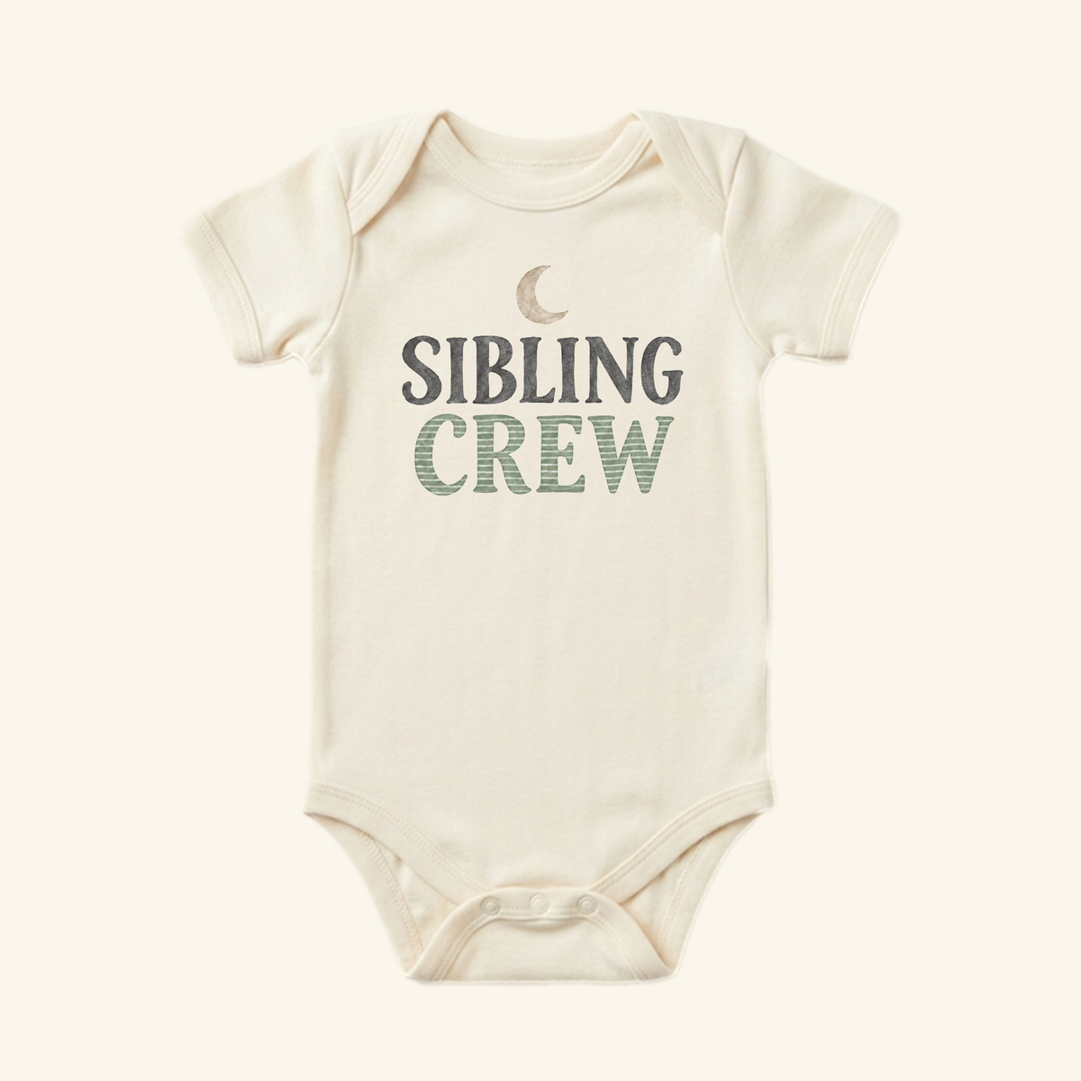 Cream-colored Sibling Crew Baby Onesie – Moon Matching Sibling Bodysuit featuring a crescent moon icon above the text SIBLING CREW.