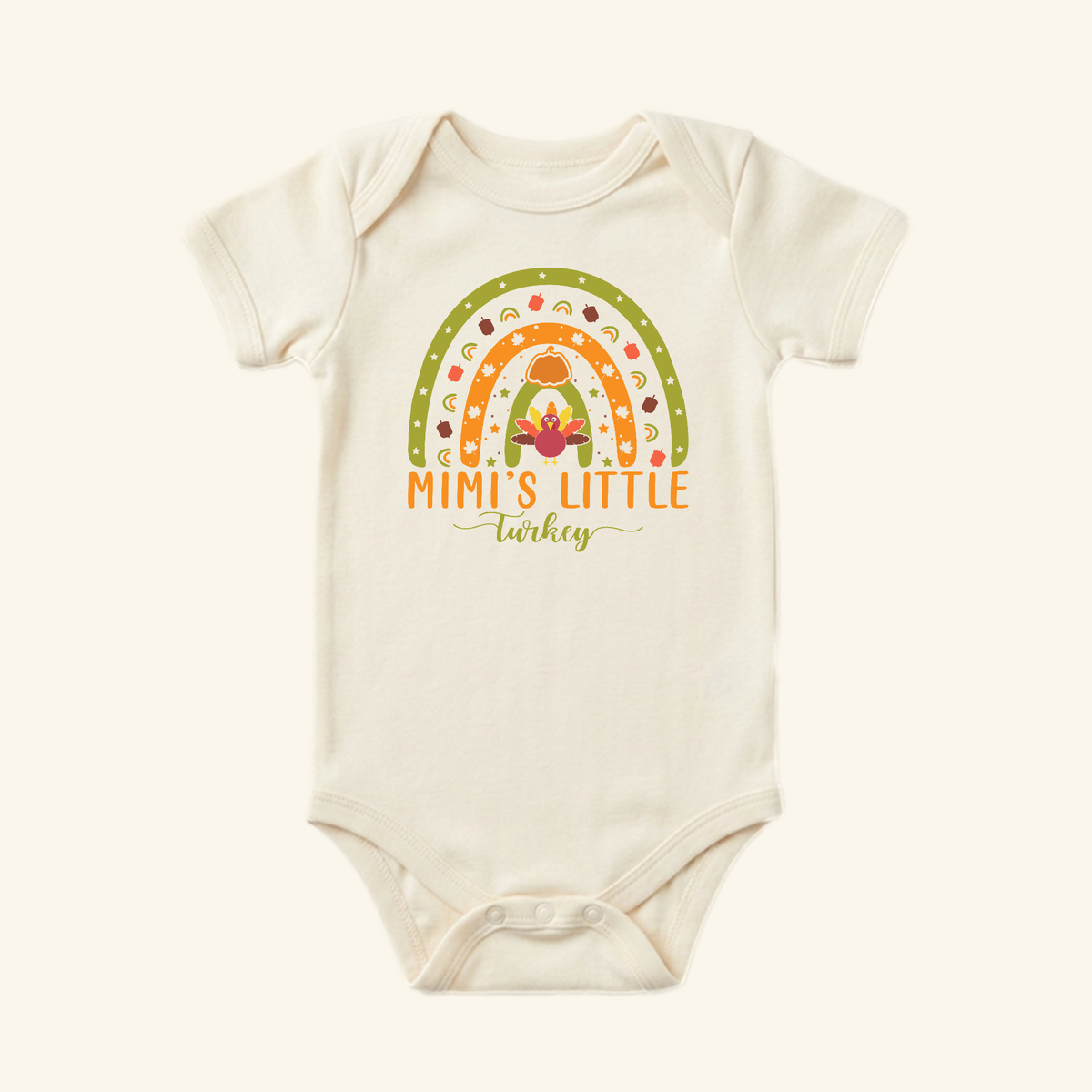 Cream-colored Mimi’s Little Turkey Baby Onesie – Grandma Thanksgiving Rainbow Bodysuit featuring a rainbow, a turkey, and the text Mimi’s Little Turkey.