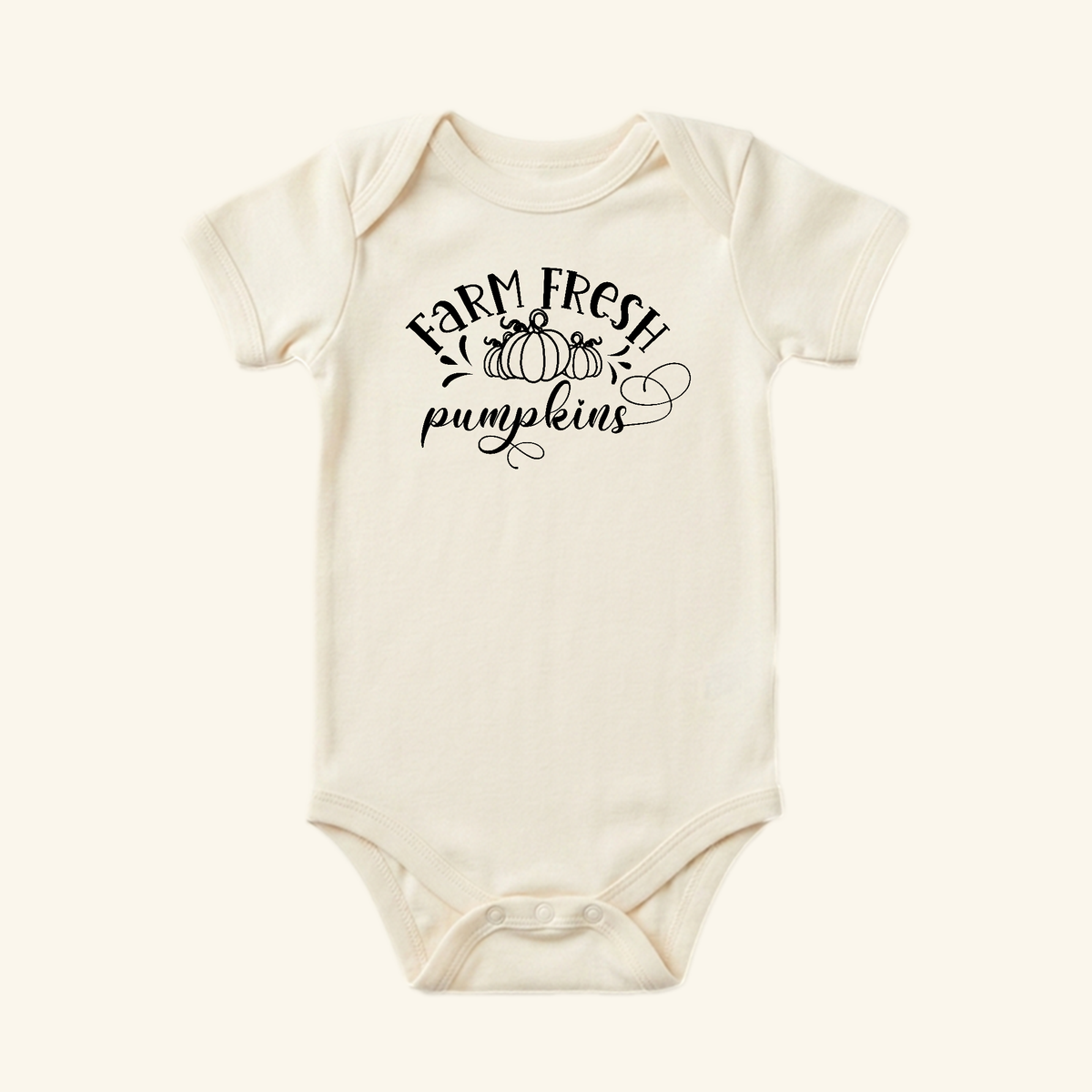 Cream-colored Farm Fresh Pumpkins Baby Onesie – Fall Farmhouse Pumpkin Bodysuit featuring a graphic of two pumpkins with the text Farm Fresh pumpkins.
