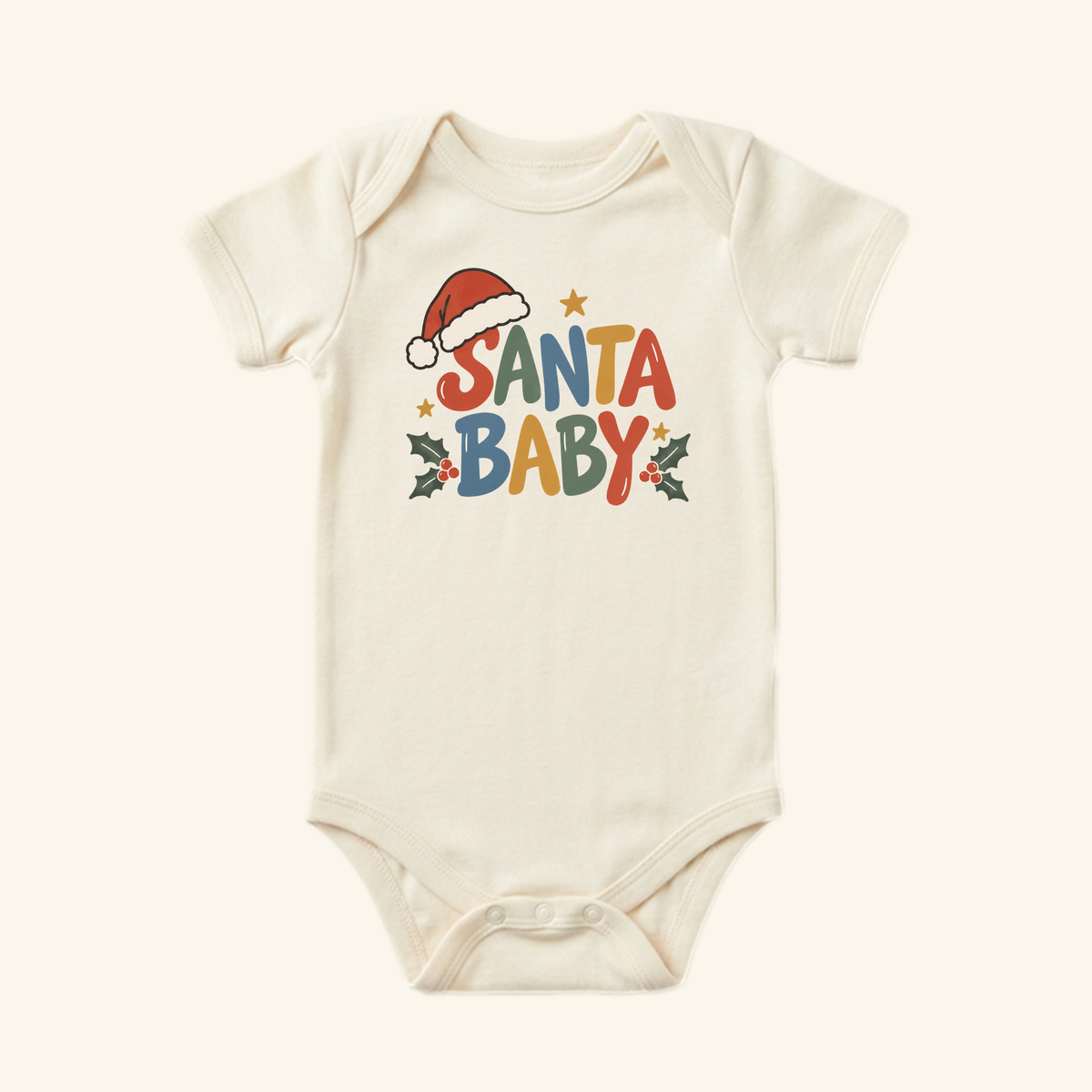 Toodleroos Santa Baby Onesie – Retro Christmas Santa Hat Bodysuit in cream, featuring SANTA BABY in colorful, retro-style lettering with a Santa hat and holly illustrations.