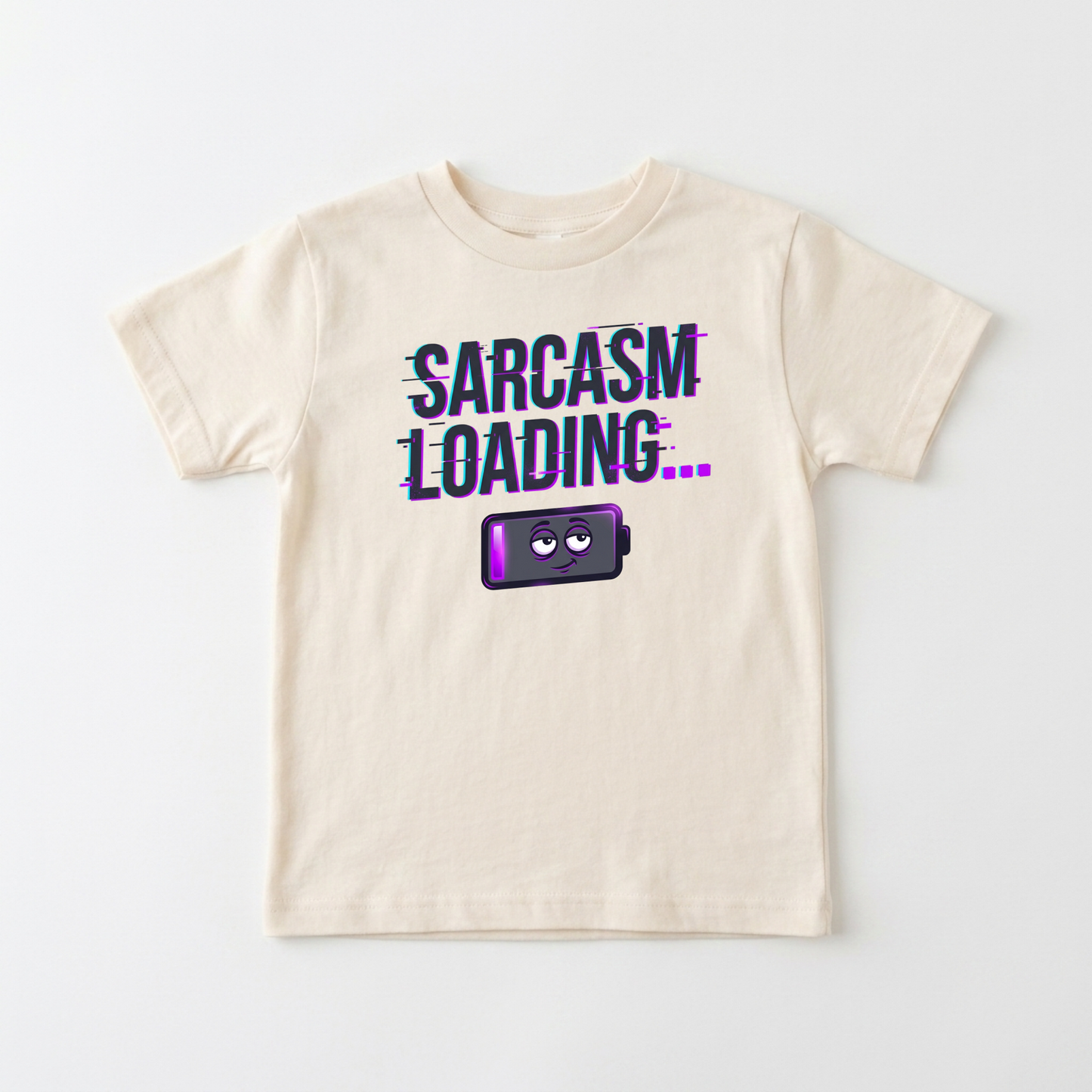 A cream-colored short-sleeve t-shirt with a graphic on the front that reads 'SARCASM LOADING.