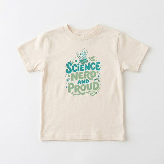 A cream-colored short-sleeve t-shirt with a 'Science Nerd and Proud' graphic printed on the chest in teal and green, displayed flat against a light gray background.