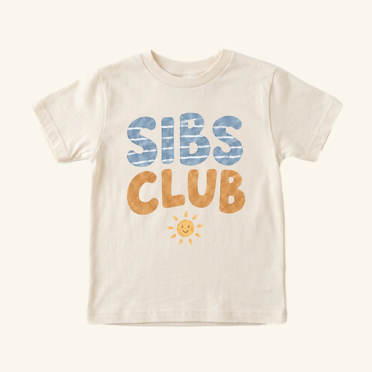 Cream-colored Sibs Club Toddler Shirt – Matching Sibling Smiley Sun Tee with blue and orange text and a small yellow smiley sun icon below.