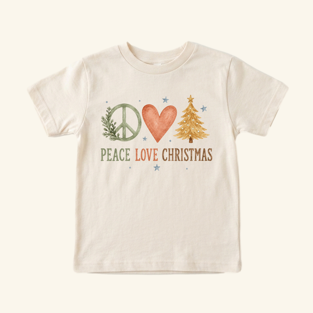 Cream-colored Peace Love Christmas Toddler Shirt – Boho Christmas Tree Tee featuring a boho Christmas tree, peace sign, and heart graphic above the text PEACE LOVE CHRISTMAS.