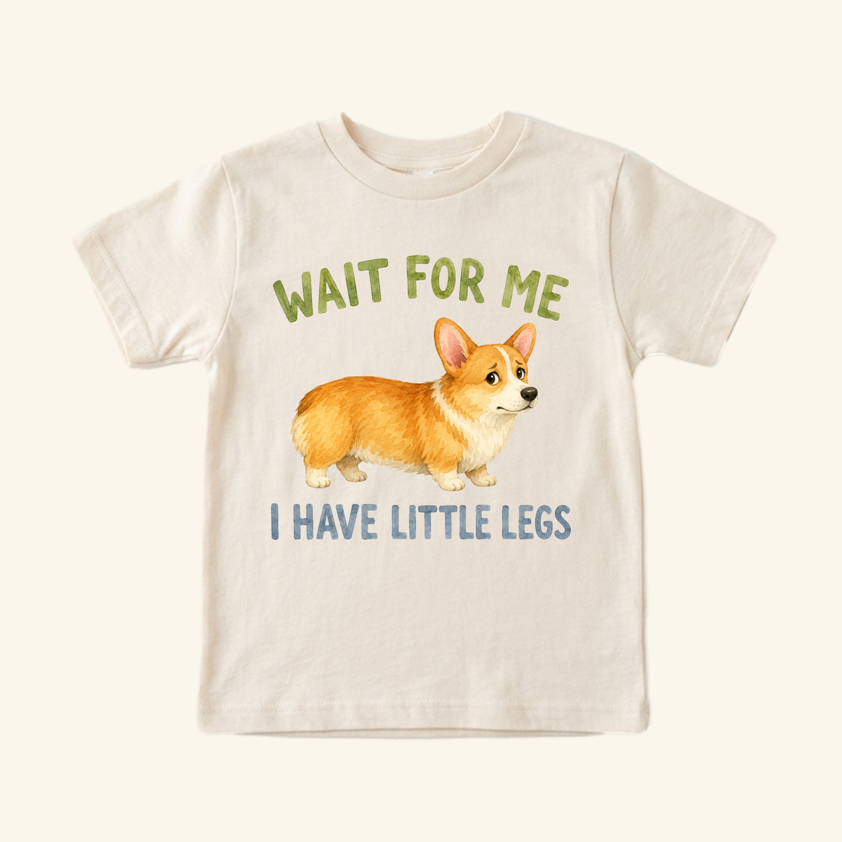 Cream-colored Funny Corgi Toddler Shirt – Wait for Me I Have Little Legs Tee featuring an illustration of a corgi and the text WAIT FOR ME I HAVE LITTLE LEGS.