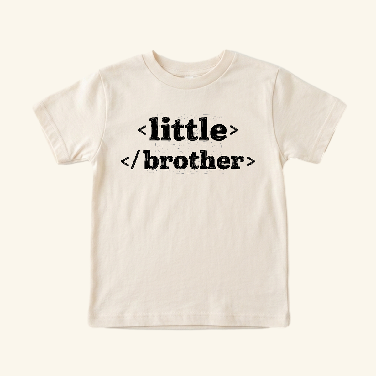 Cream-colored Little Brother Toddler Shirt – HTML Code Sibling Announcement Tee featuring a little brother design printed in black HTML code.