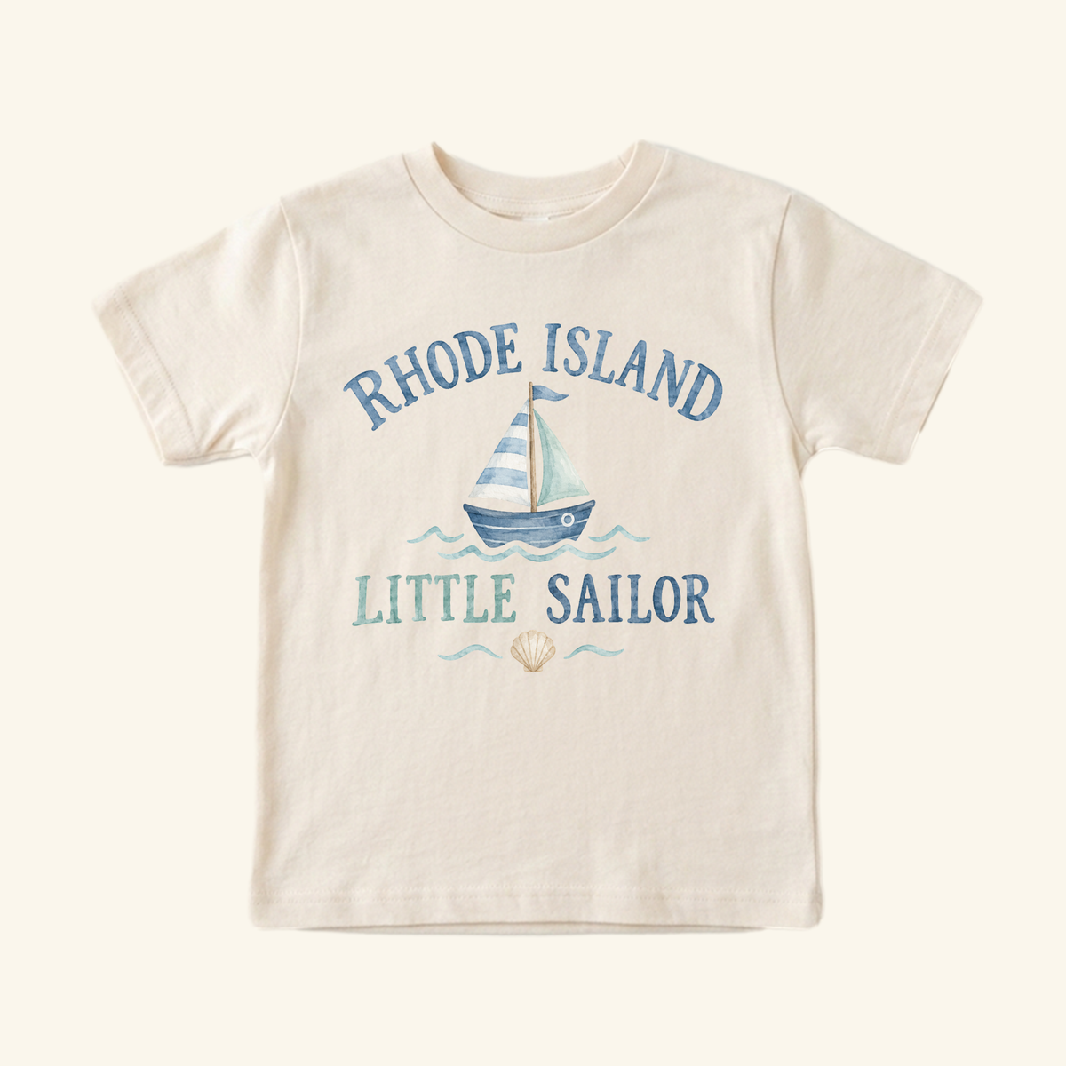 Cream-colored Rhode Island Toddler Shirt – Little Sailor Sailboat Tee featuring a watercolor illustration of a sailboat with the text Rhode Island Little Sailor above and below the boat.