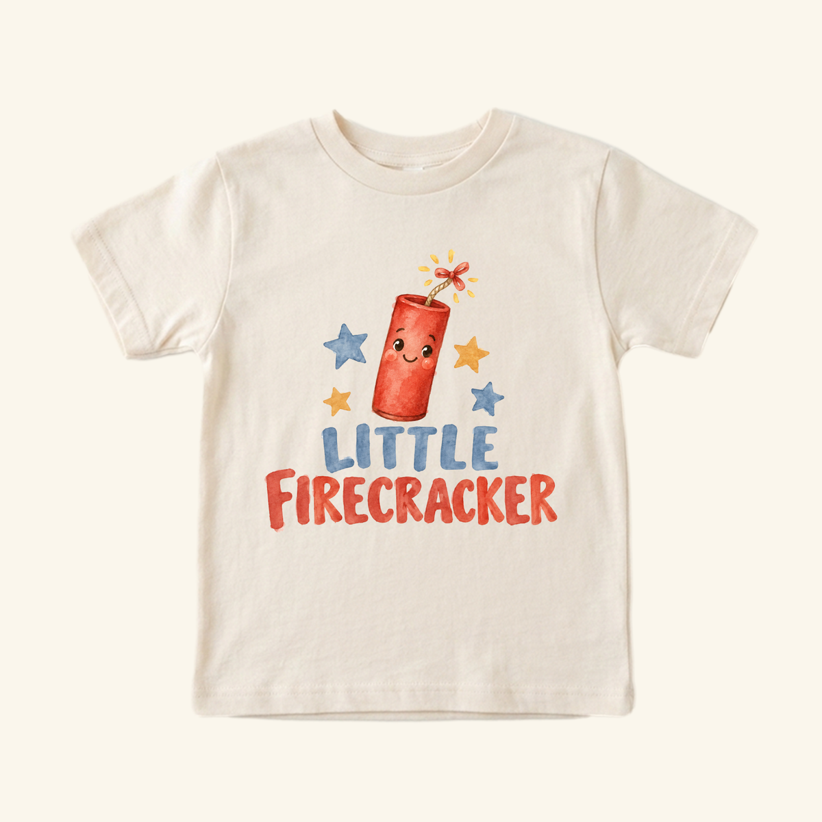 Off-white Little Firecracker Toddler Shirt featuring a smiling firecracker surrounded by small stars and the text LITTLE FIRECRACKER.
