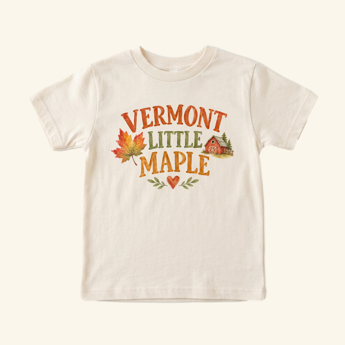 Cream Toodleroos Vermont Toddler Shirt – Little Maple Fall Foliage Barn Tee featuring a maple leaf, a red barn, and a heart.