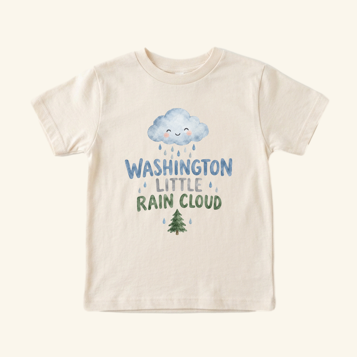 Washington Toddler Shirt – Little Rain Cloud Pacific Northwest Tee featuring a cream toddler t-shirt with a watercolor illustration of a smiling rain cloud, the text Washington Little Rain Cloud, and a small evergreen tree.