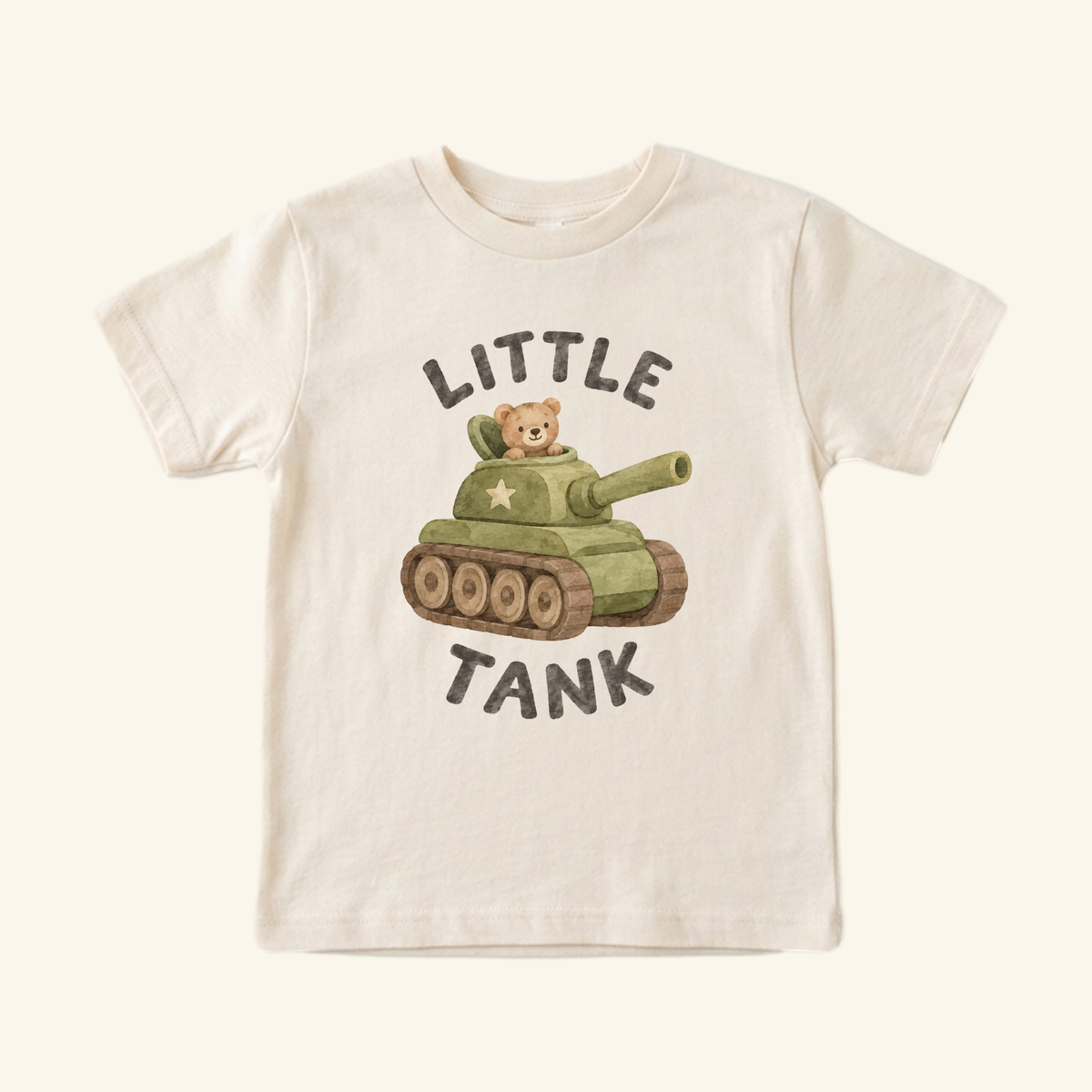 Cream-colored Little Tank Toddler Shirt featuring a teddy bear inside an army tank with the text LITTLE TANK above and below the design.