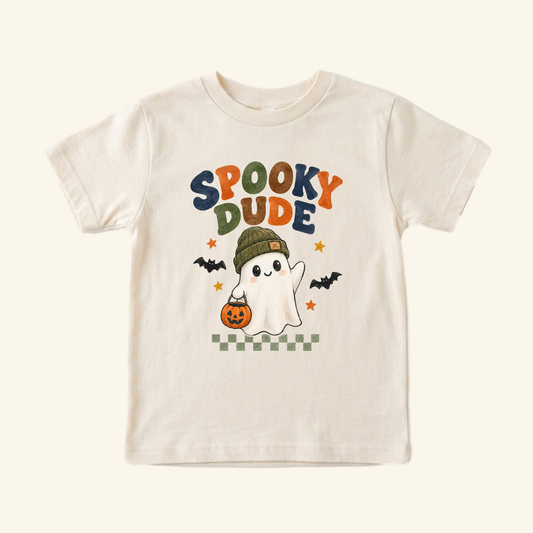 Cream-colored Spooky Dude Ghost Toddler Halloween Shirt – Short-Sleeve Tee featuring a cartoon ghost wearing a beanie and holding a jack-o-lantern pumpkin bucket, with the text SPOOKY DUDE above.